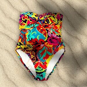 Cute one piece. Only worn once. Tummy control and flattering